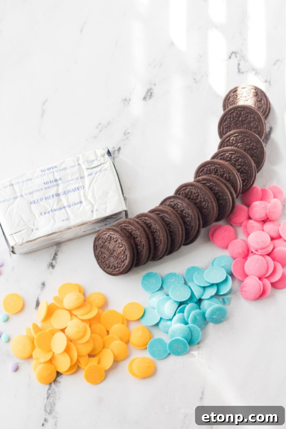Easter Egg Oreo Truffles ingredients on a marble counter top 