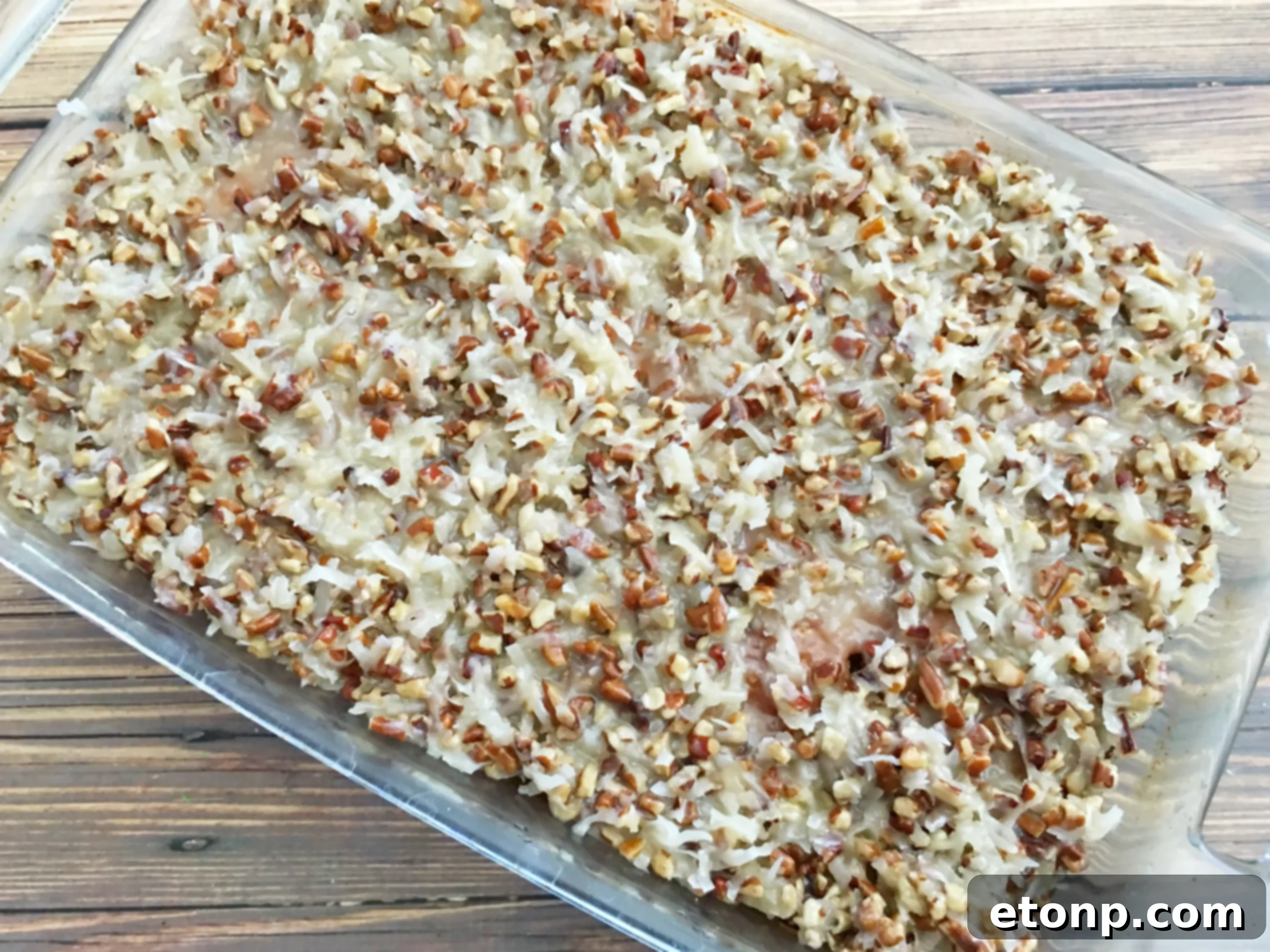 Super Simple Tornado Cake! 7 The delicious topping being gently poured over the poked cake