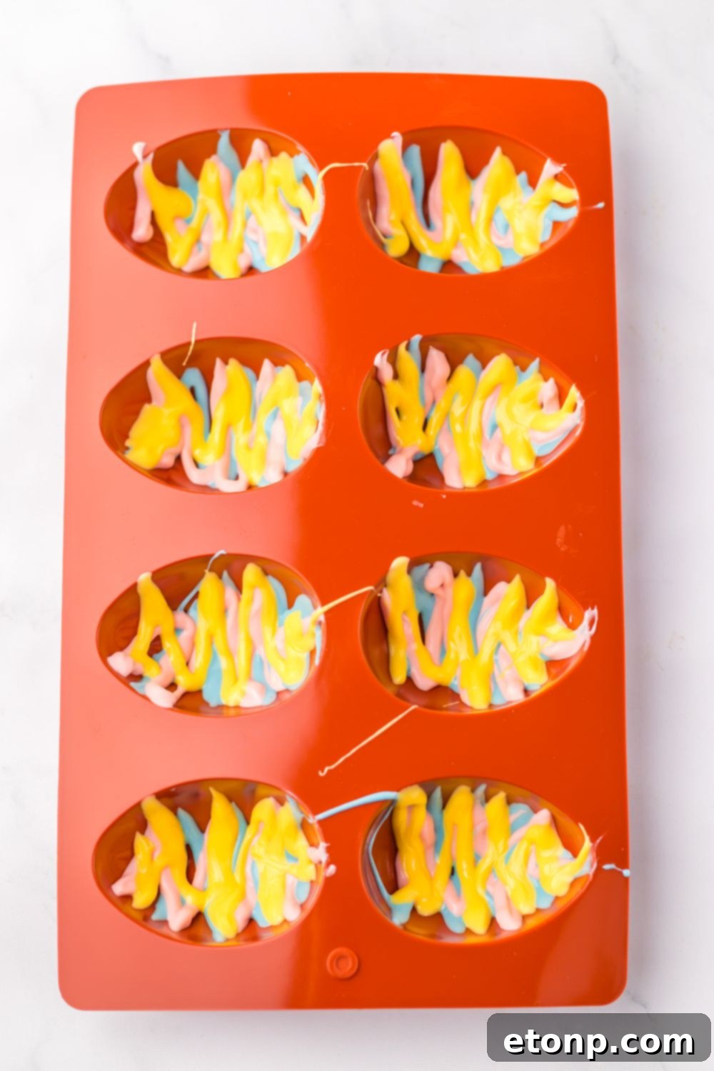 Easter Marshmallow Eggs colored chocolate drizzled in silicone mold 