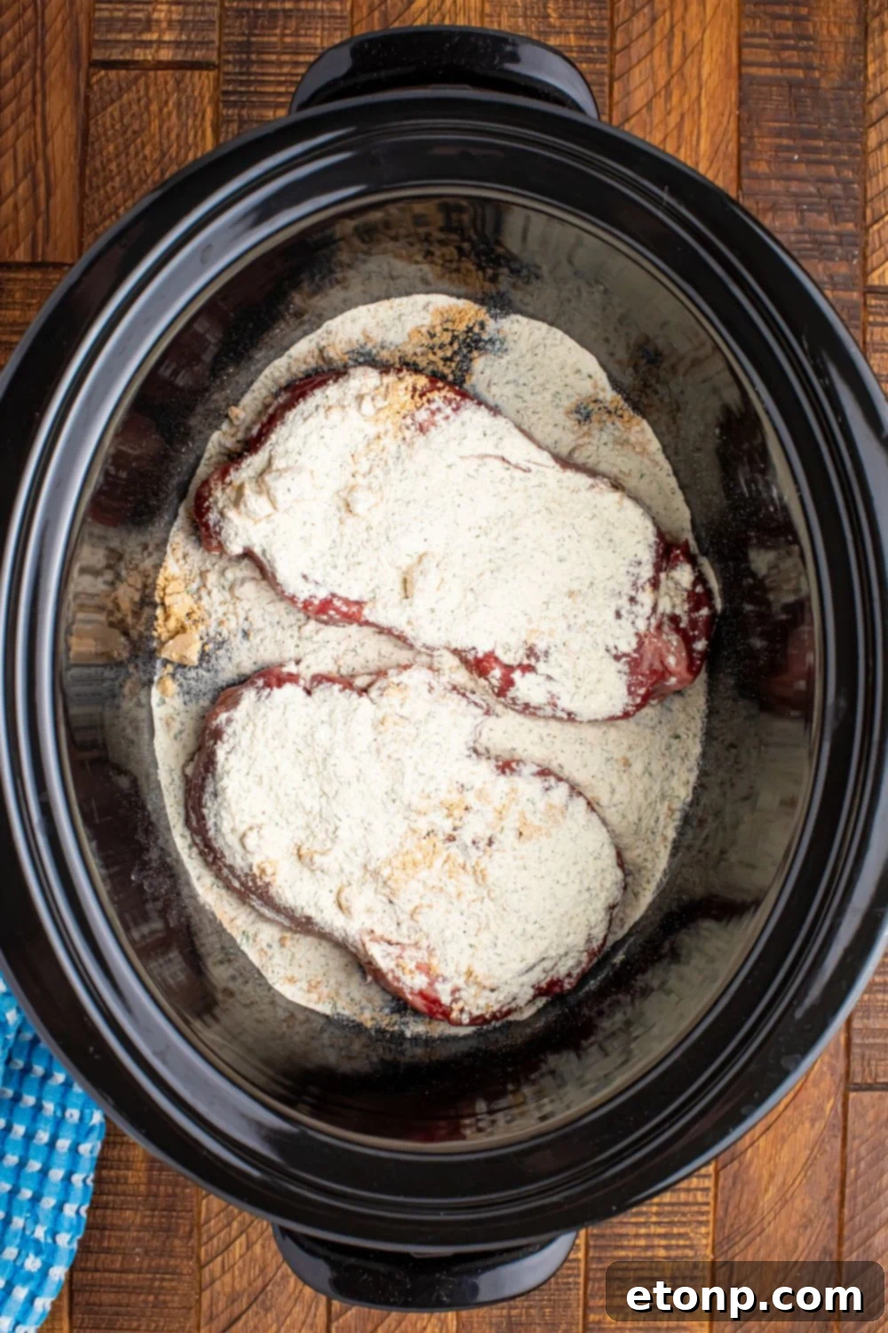 Slow Cooker Mississippi Ribeye Steaks with ranch and au jus powder over seaks