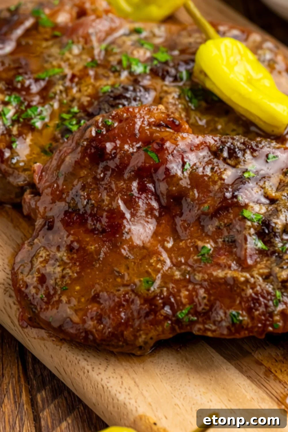 Mississippi Ribeye Steaks on a wooden cuting board on table