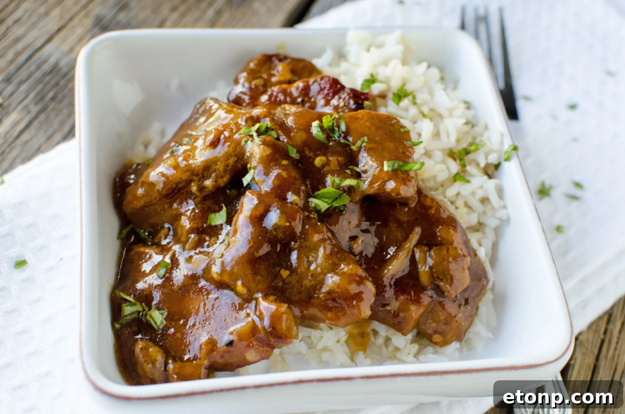 Slow Cooker Garlic Ginger Chicken, showing a similar saucy texture
