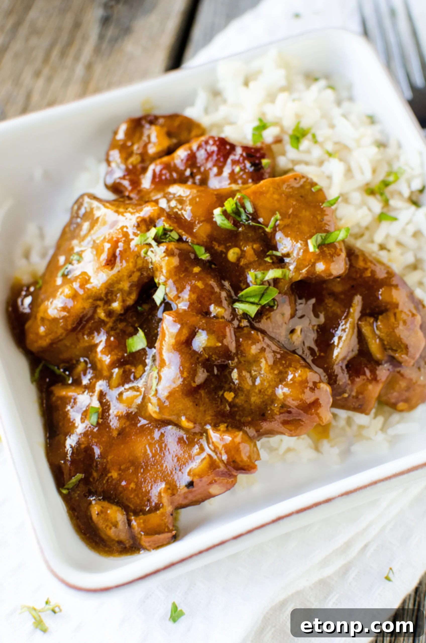 Slow Cooker Garlic Ginger Pork served with cauliflower rice for a low-carb option