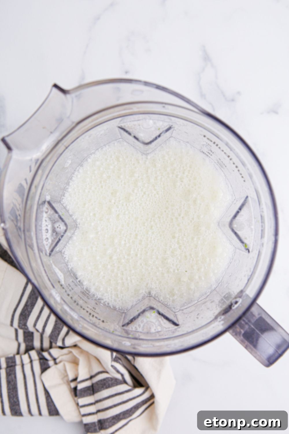 Brazilian Limeade blended up in a blender with a look into the blender