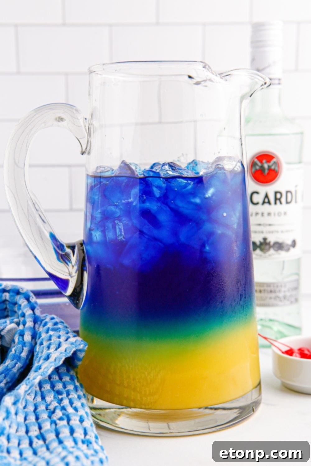 Blue Hawaiian Punch layered in a glass pitcher