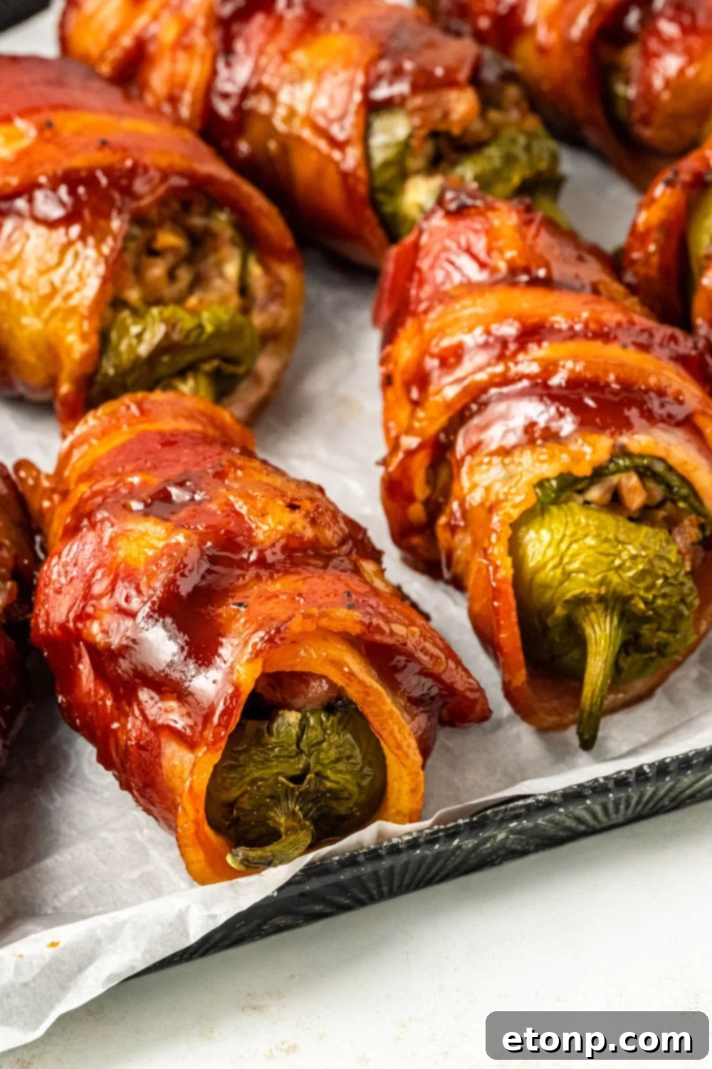 Cooked Texas Twinkies neatly arranged on a cookie sheet, ready for serving or storage.