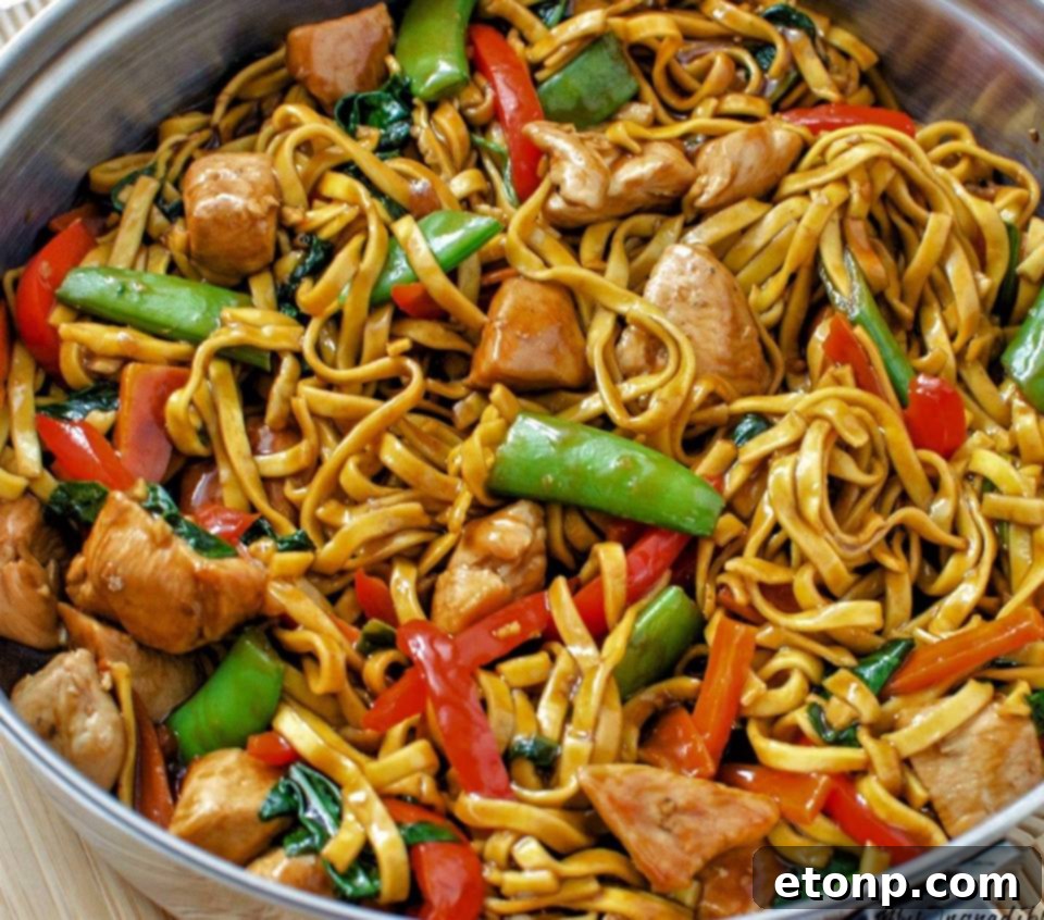 Dry lo mein noodles and other ingredients for the recipe