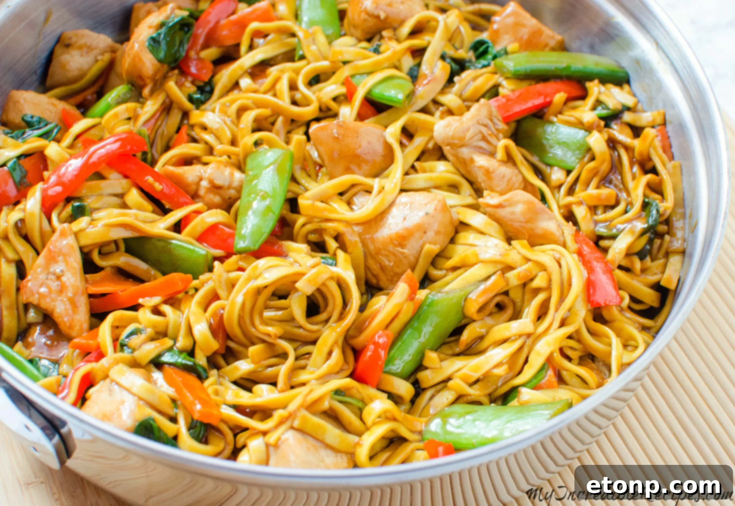 Close-up of the delicious chicken lo mein in a pan