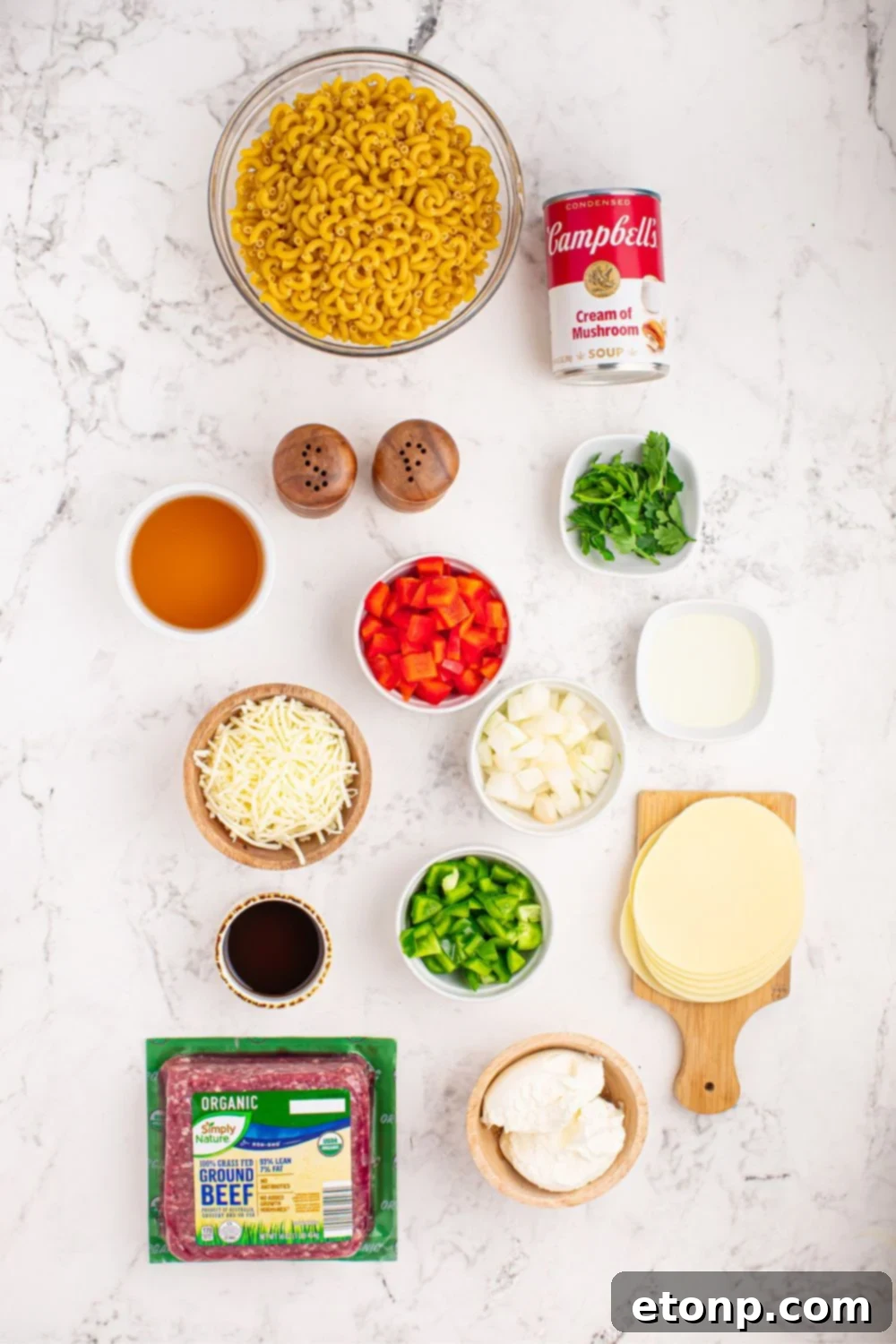 ingredients for Philly Cheesesteak Pasta on table in single serving bowls 