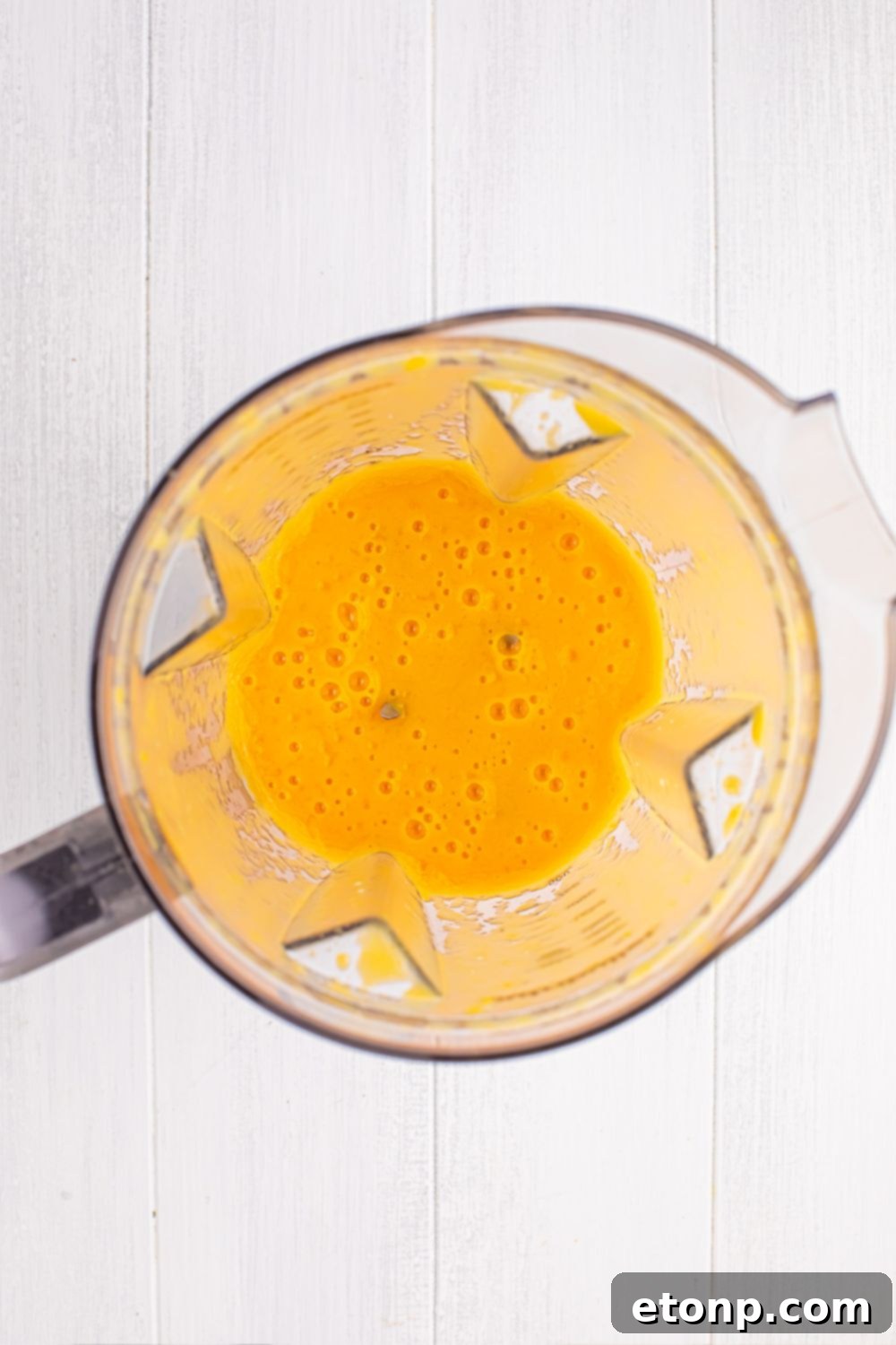 Southern Peach Infusion 8 blender with a peach mixture blended up