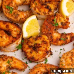 Cajun Grilled Shrimp served on a table with lemon slices, highlighting a perfect weeknight meal.