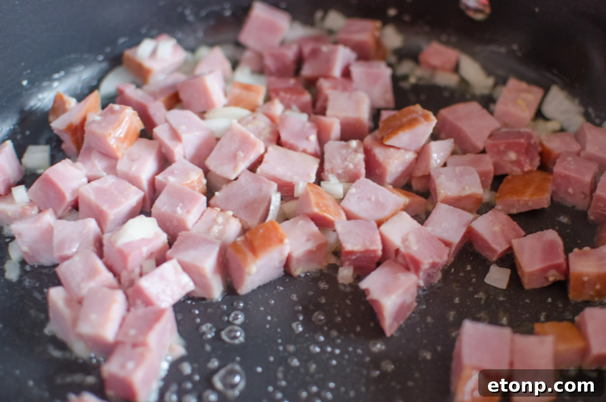 Overhead shot of Haluski in a large serving bowl, showcasing the mix of ingredients.