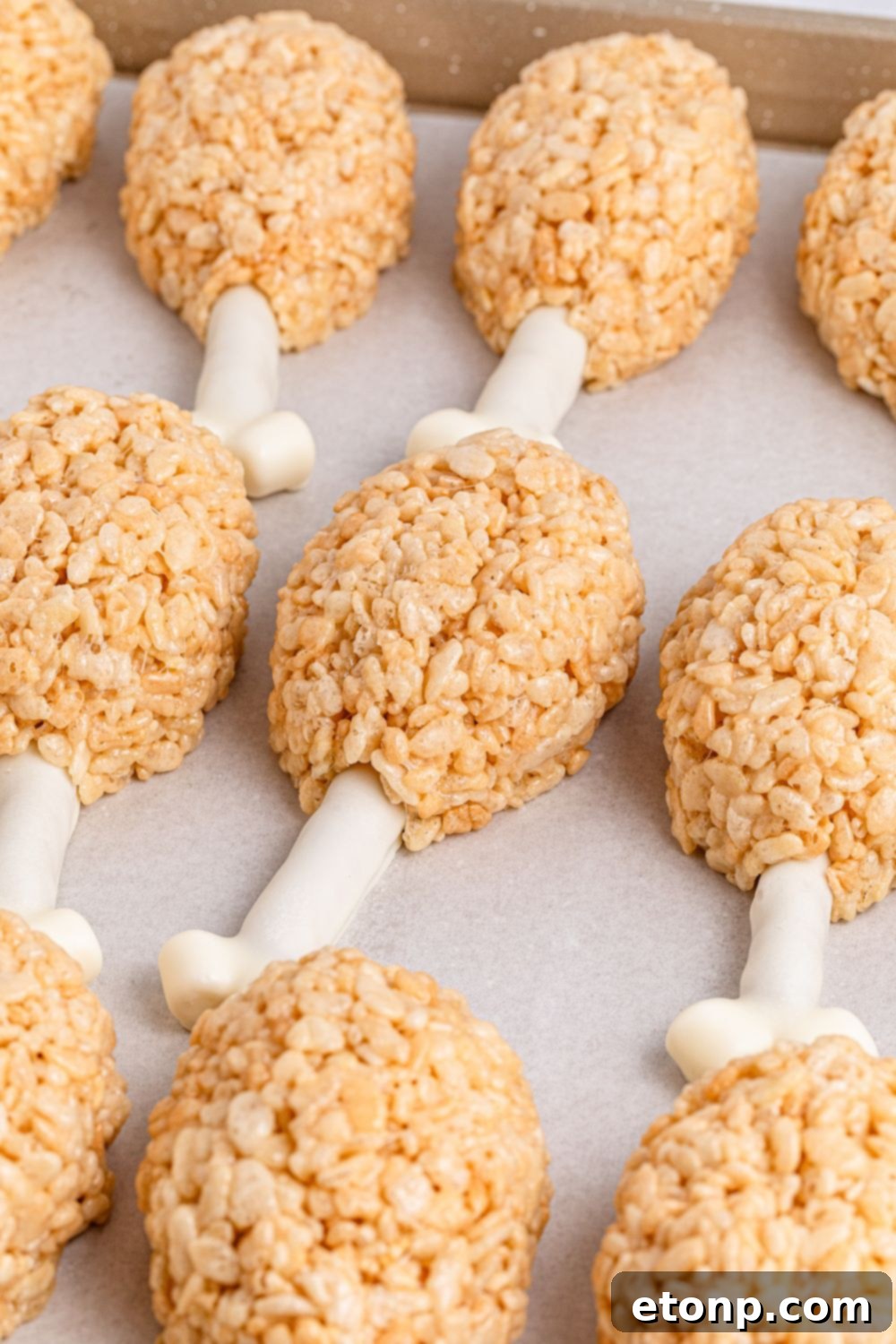 Rice Krispie Treat Turkey Legs on a white tray 