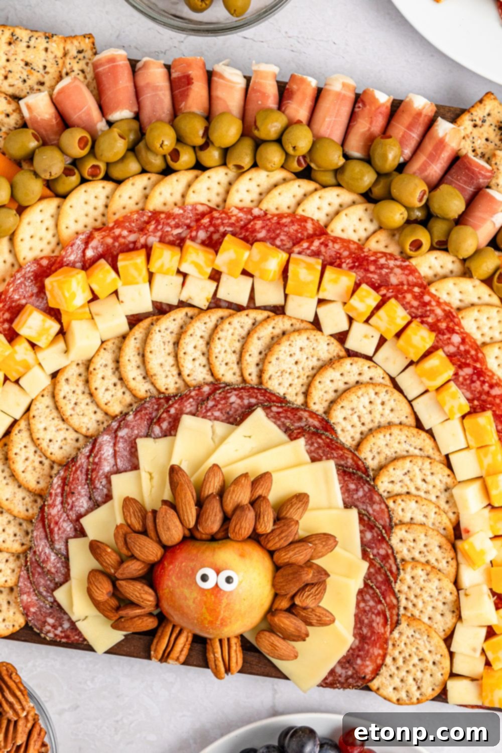 Turkish Mezze Spread 13 Charcuterie board resembling a turkey, positioned elegantly on a table at an angle to highlight its intricate arrangement.