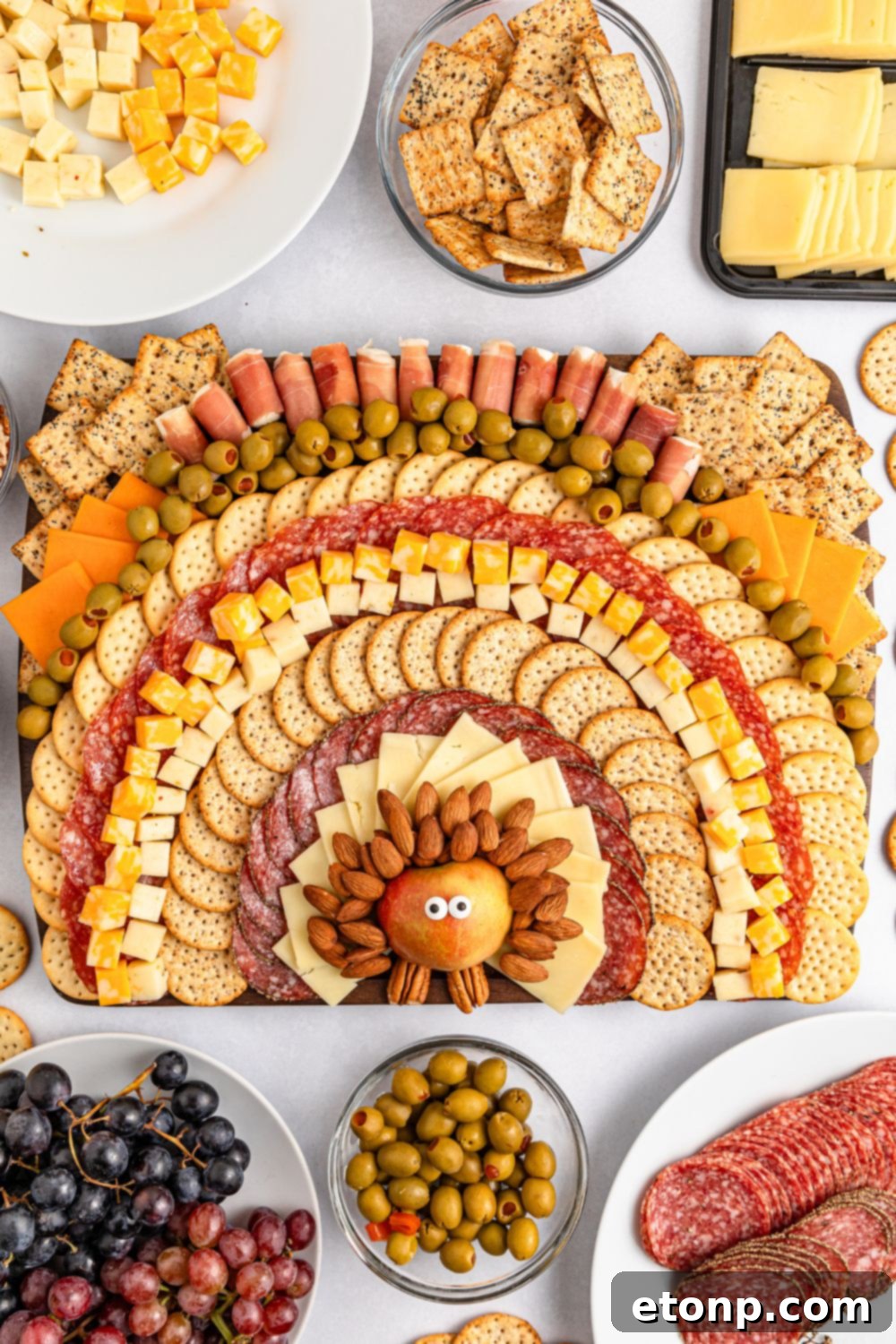 Turkish Mezze Spread 14 Overhead view of a complete Thanksgiving charcuterie board, artistically arranged on a table for serving.