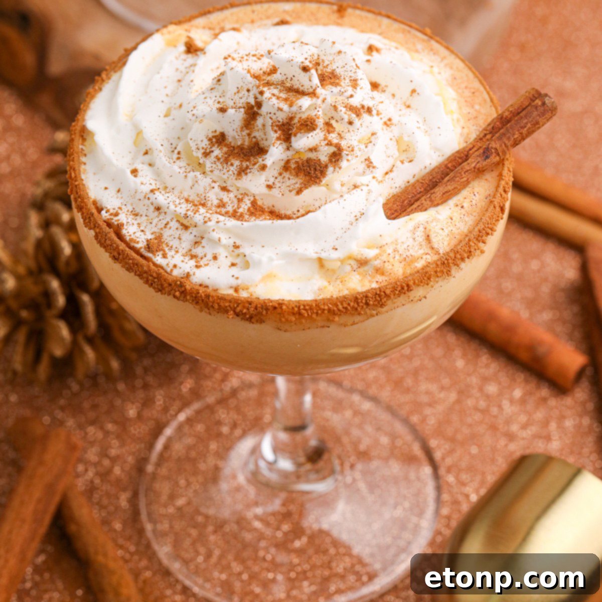 glass of pumpkin martinis on a table 