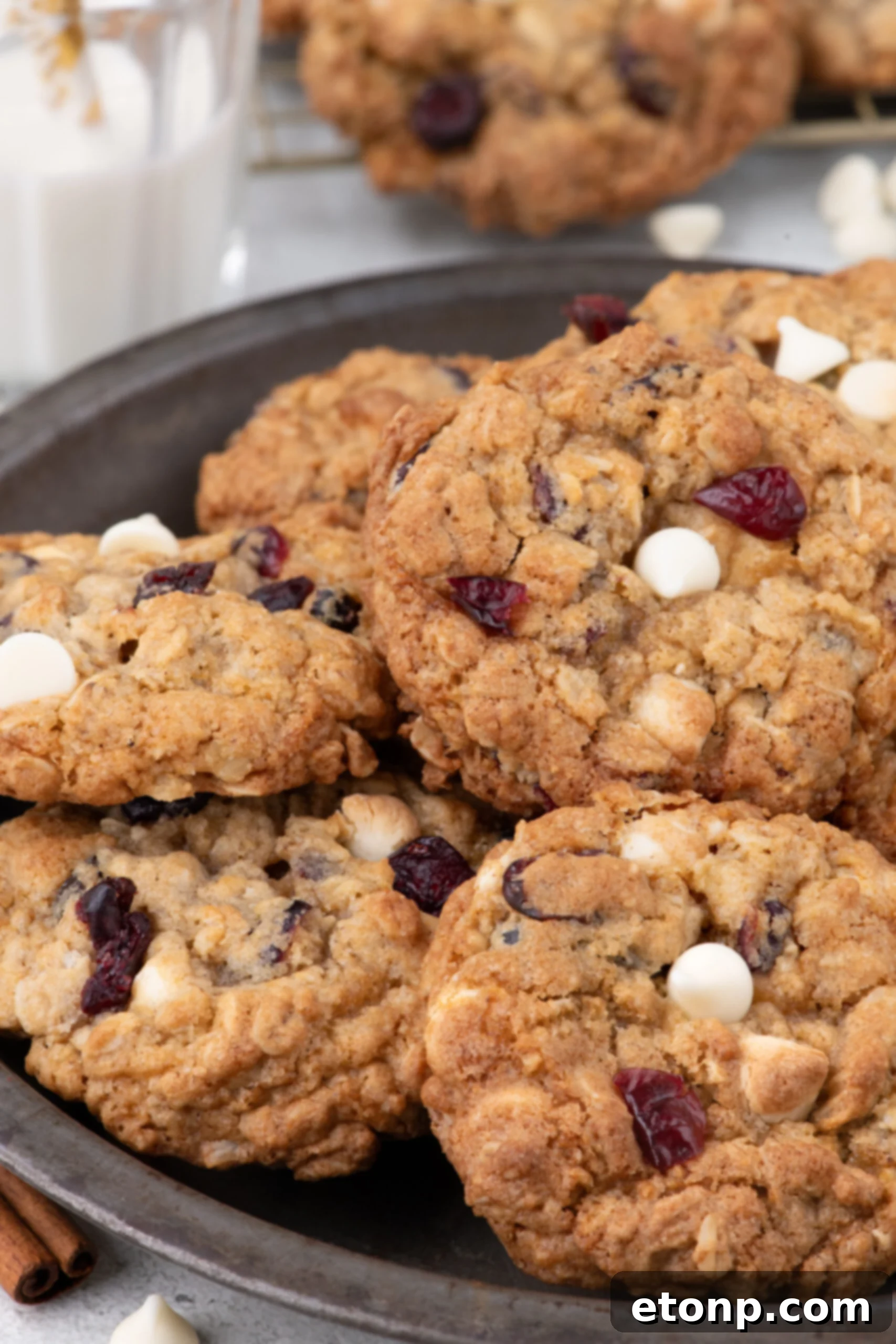 White Chocolate Cranberry Oatmeal Cookies piled on a plate
