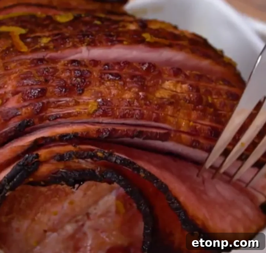 Delicious Coca-Cola ham slices arranged beautifully on a plate