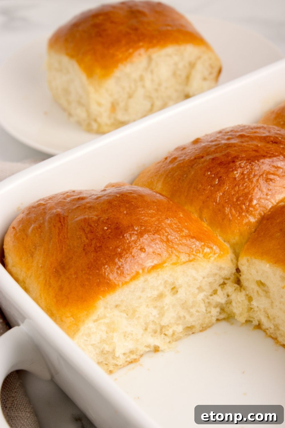 Pull Apart Rolls in a baking dish on a table, perfectly baked and ready to serve