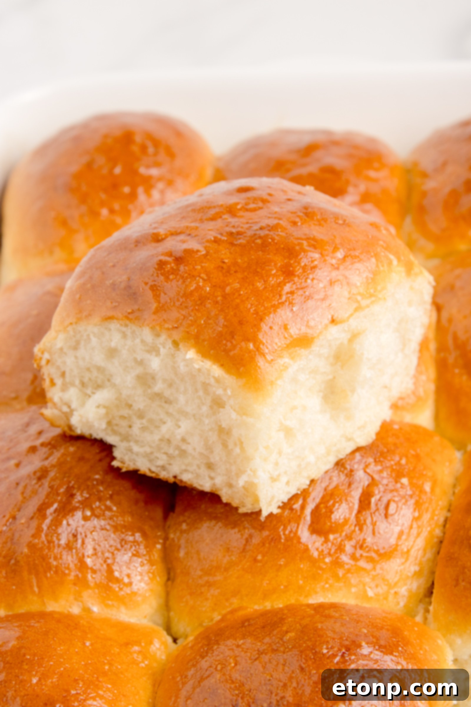 Close-up shot of the soft, pillowy texture of a pull apart dinner roll