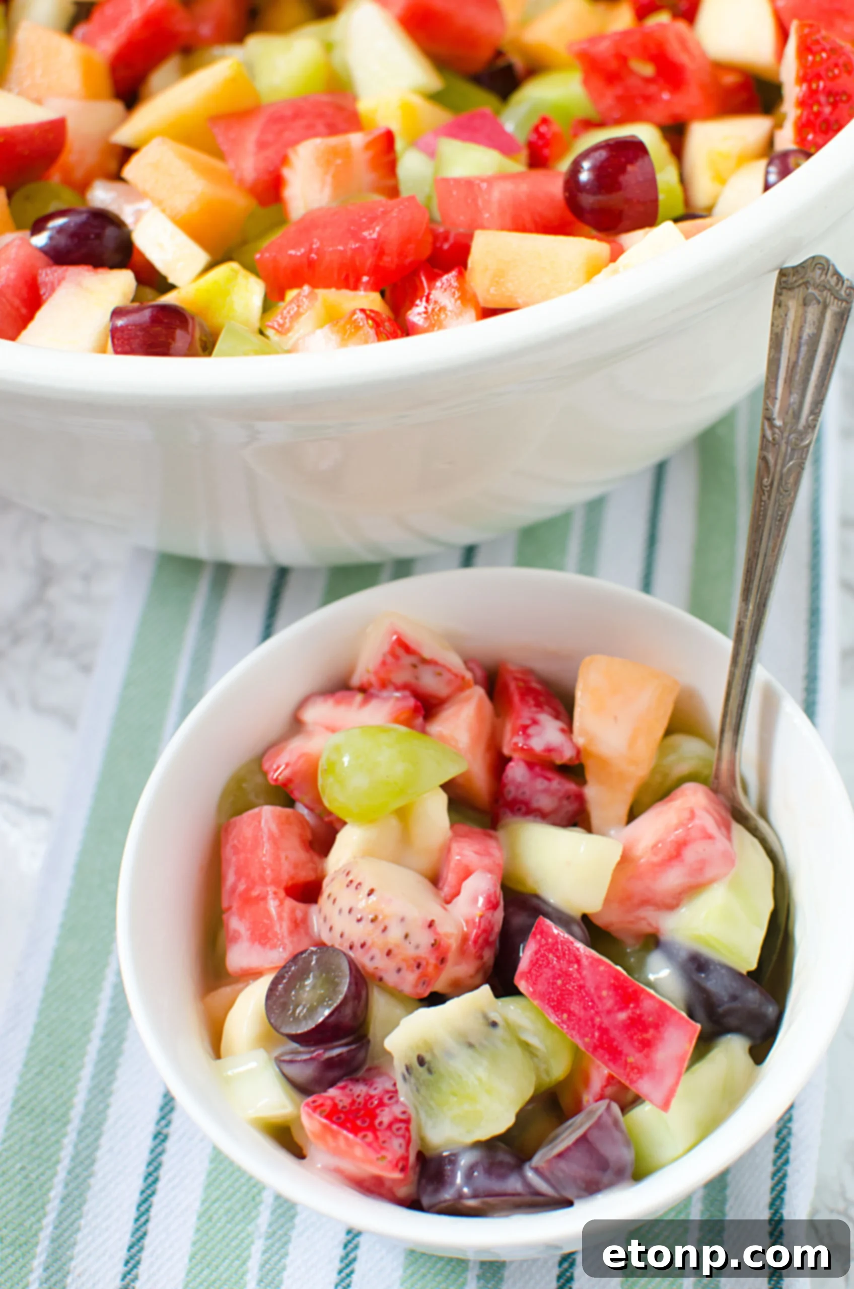 An artistic arrangement of various fresh fruits, suggesting the versatility of the recipe