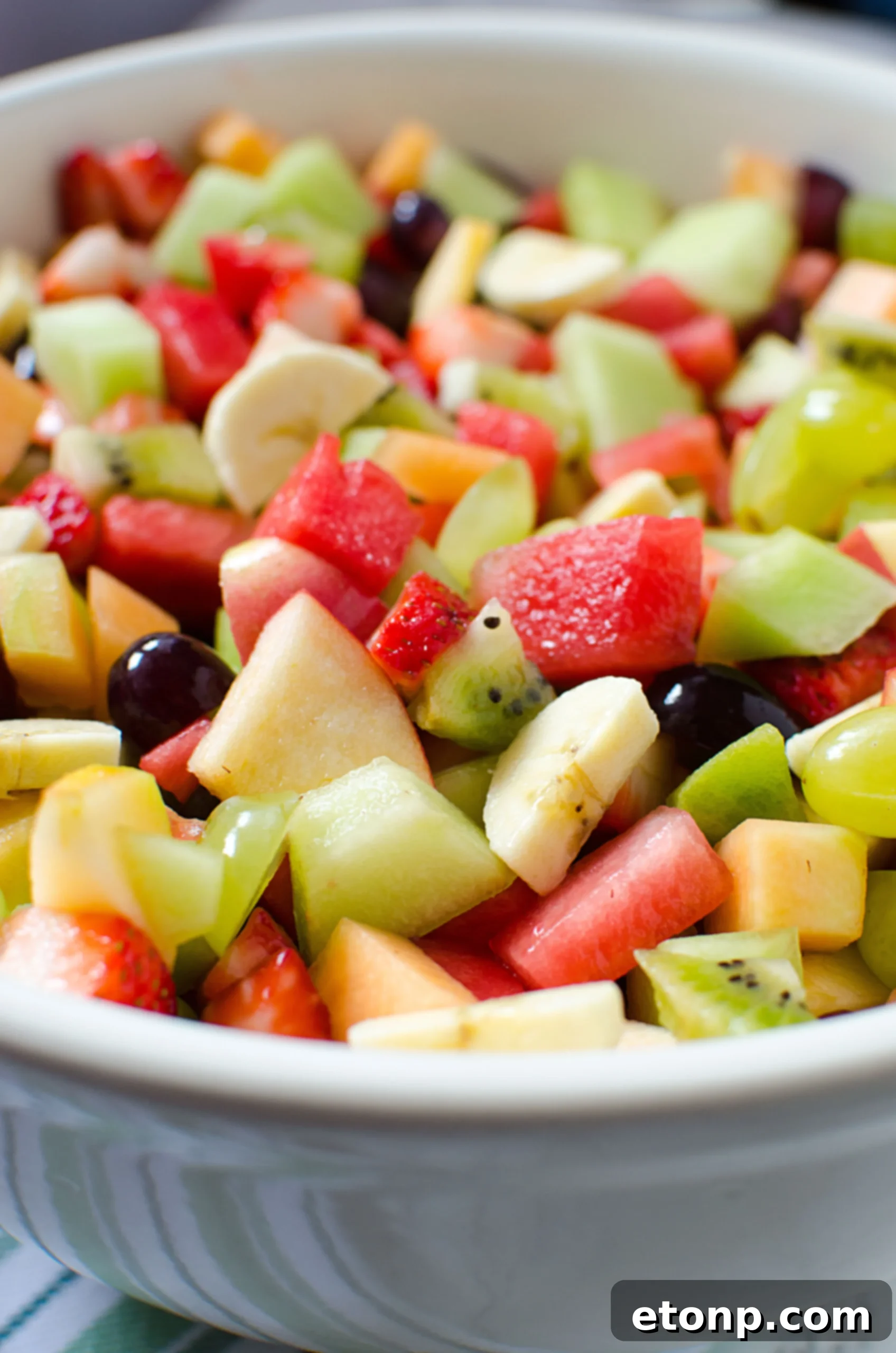 Bowl of freshly chopped fruit, ready for the glaze