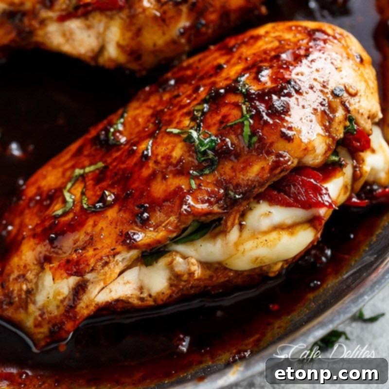 Caprese stuffed balsamic chicken served with a side of vegetables