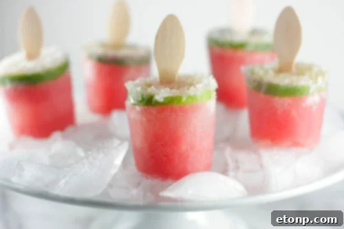Watermelon margarita popsicles served in glasses