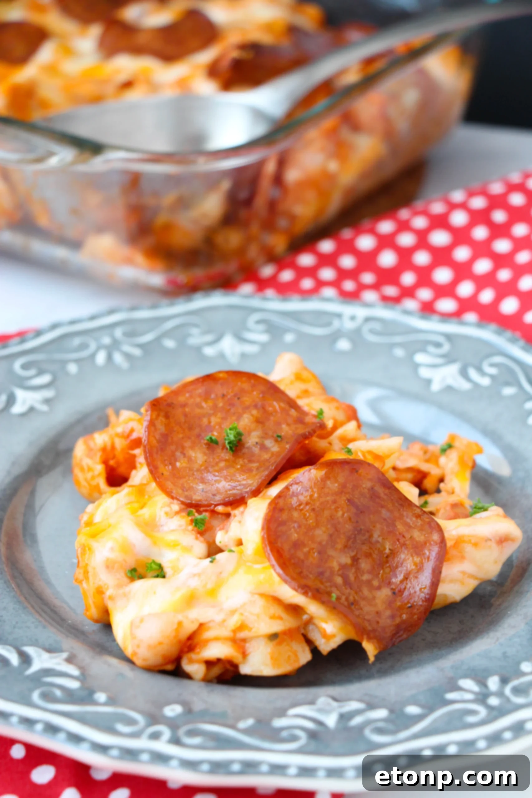 Delicious baked pasta dish being served.