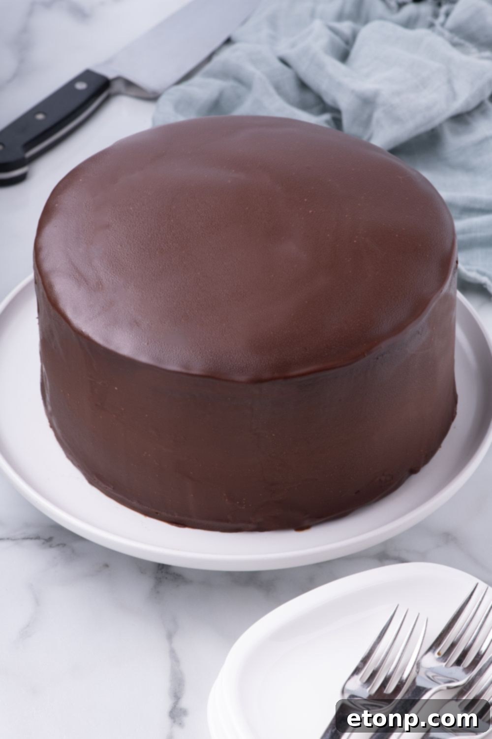 Ding Dong Cake sitting on a plate on table 