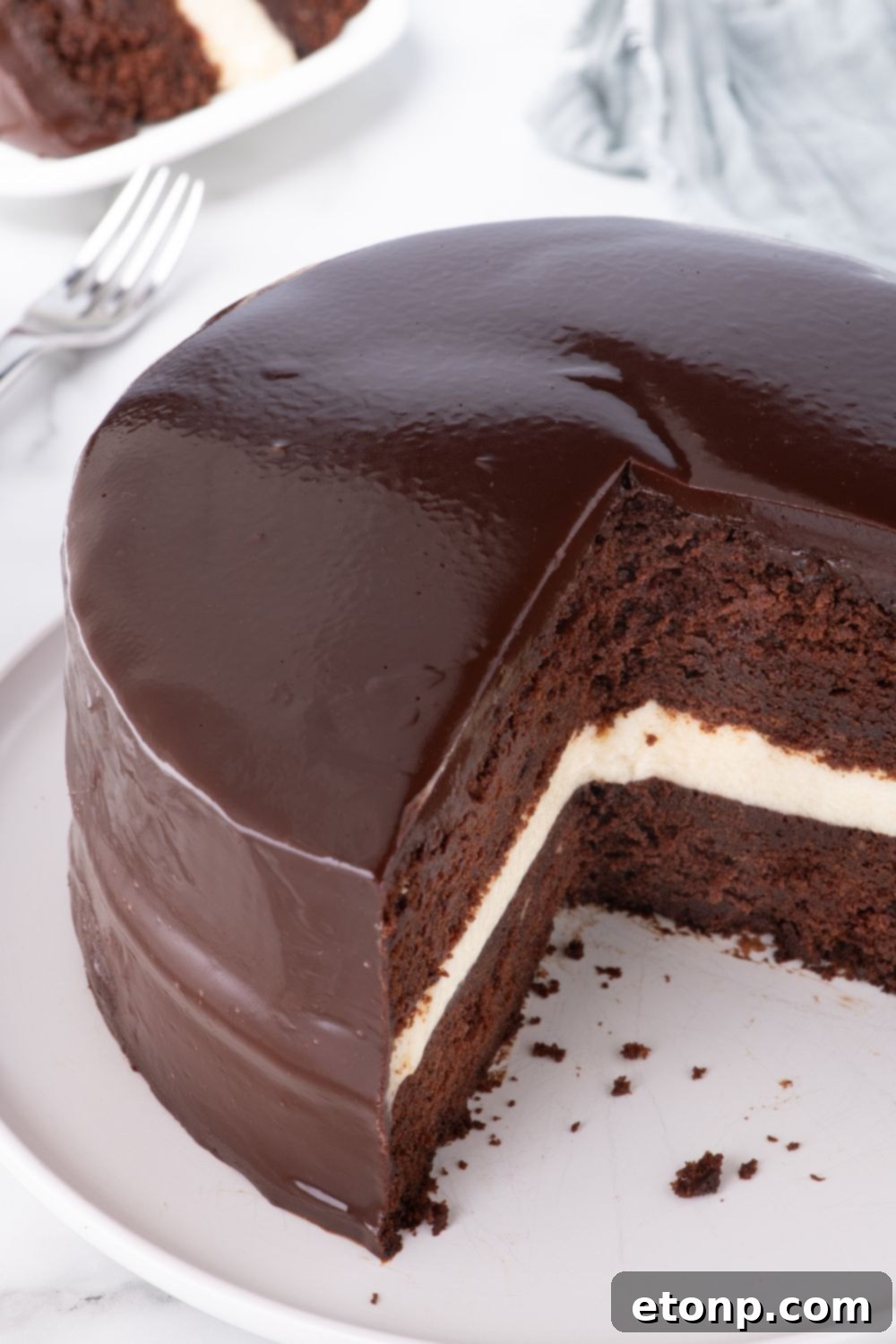 overhead look of Ding Dong Cake on table with a few slices taken out 