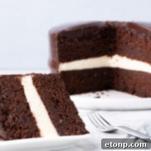 Ding Dong Cake on table with a slice of cake on plate