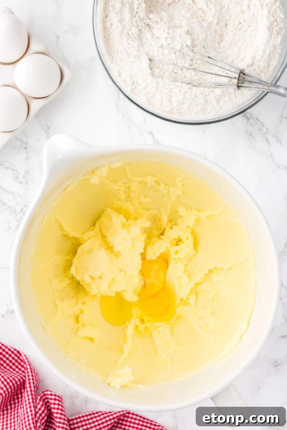 butter creamed together in bowl sitting on a table