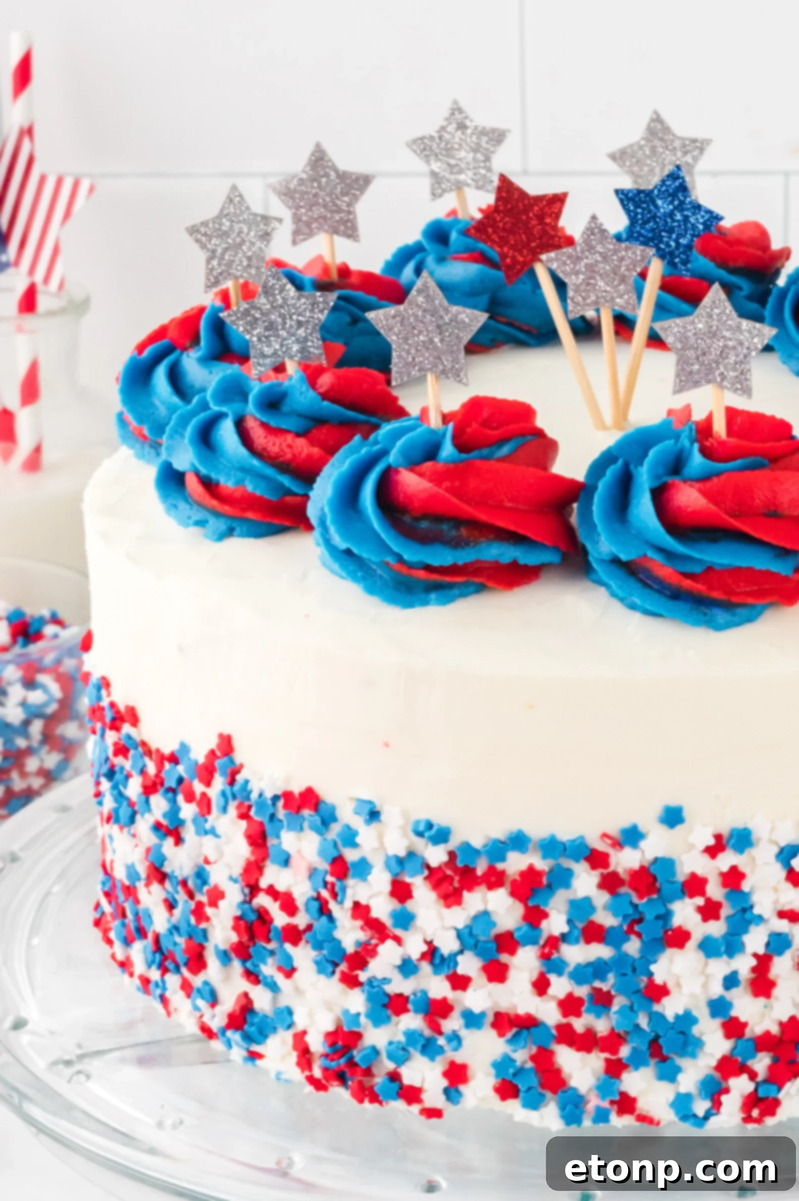 American Flag Layered Cake on a clear cake stand 