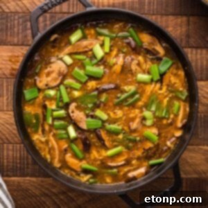 P.F. Chang's Hot and Sour Soup in a pan on a wooden table