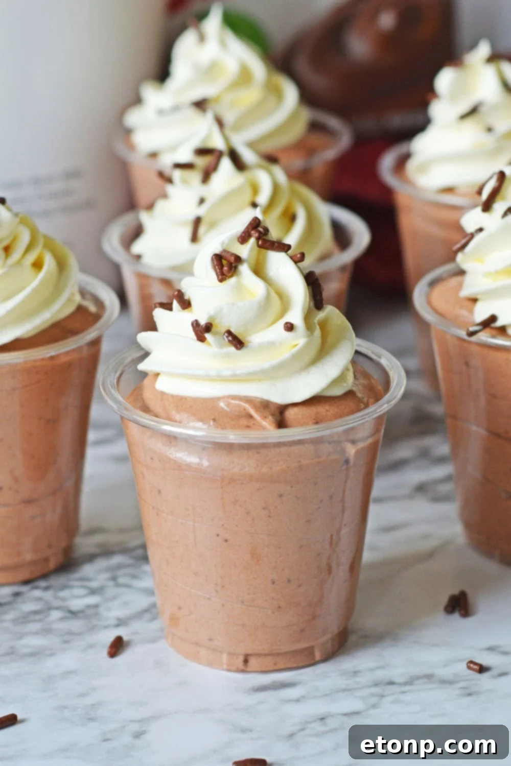 Decadent Chocolate RumChata Pudding Shots 5 Rumchata Pudding Shots in shots on table