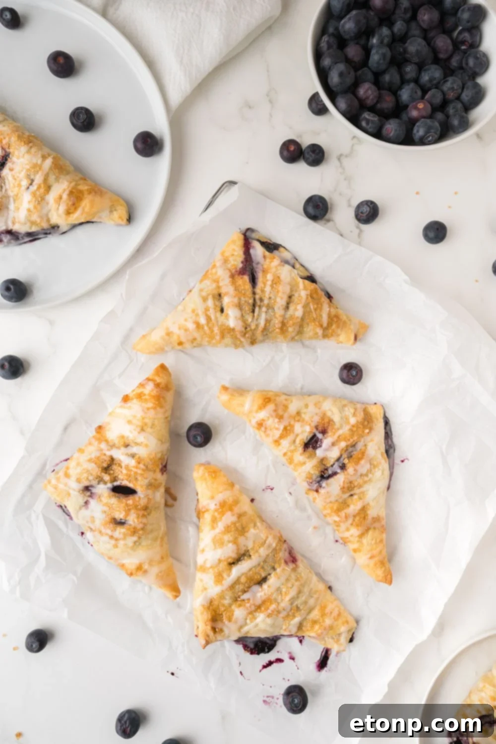 Blueberry Turnovers spread out on table 