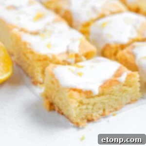 Lemon Sugar Cookie Bars cut and sat on table