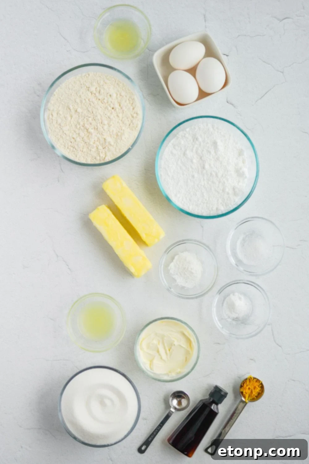 ingredients for Lemon Sugar Cookie Bars in single serve containers on table 