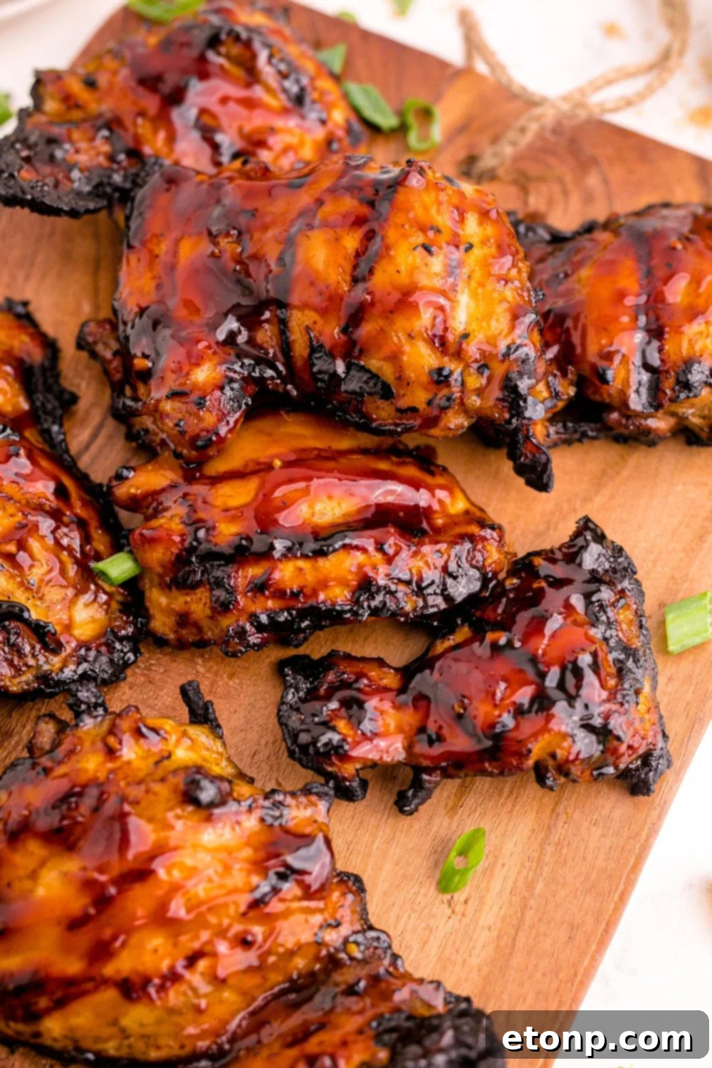 A vibrant spread of Huli Huli Chicken and side dishes arranged beautifully on a table for a festive meal