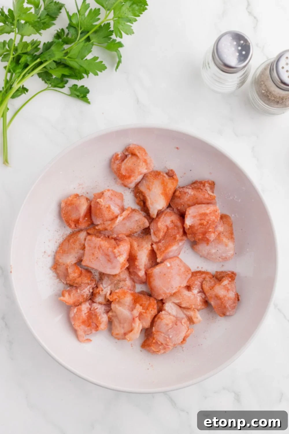 Buttery Garlic Chicken Bites 8 diced chicken in skillet