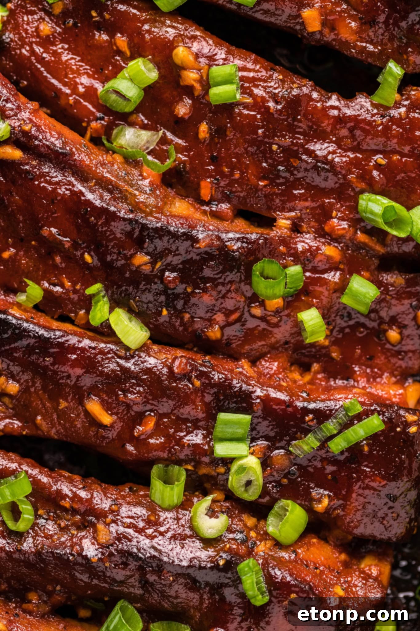 Ribs with various side dishes on a board