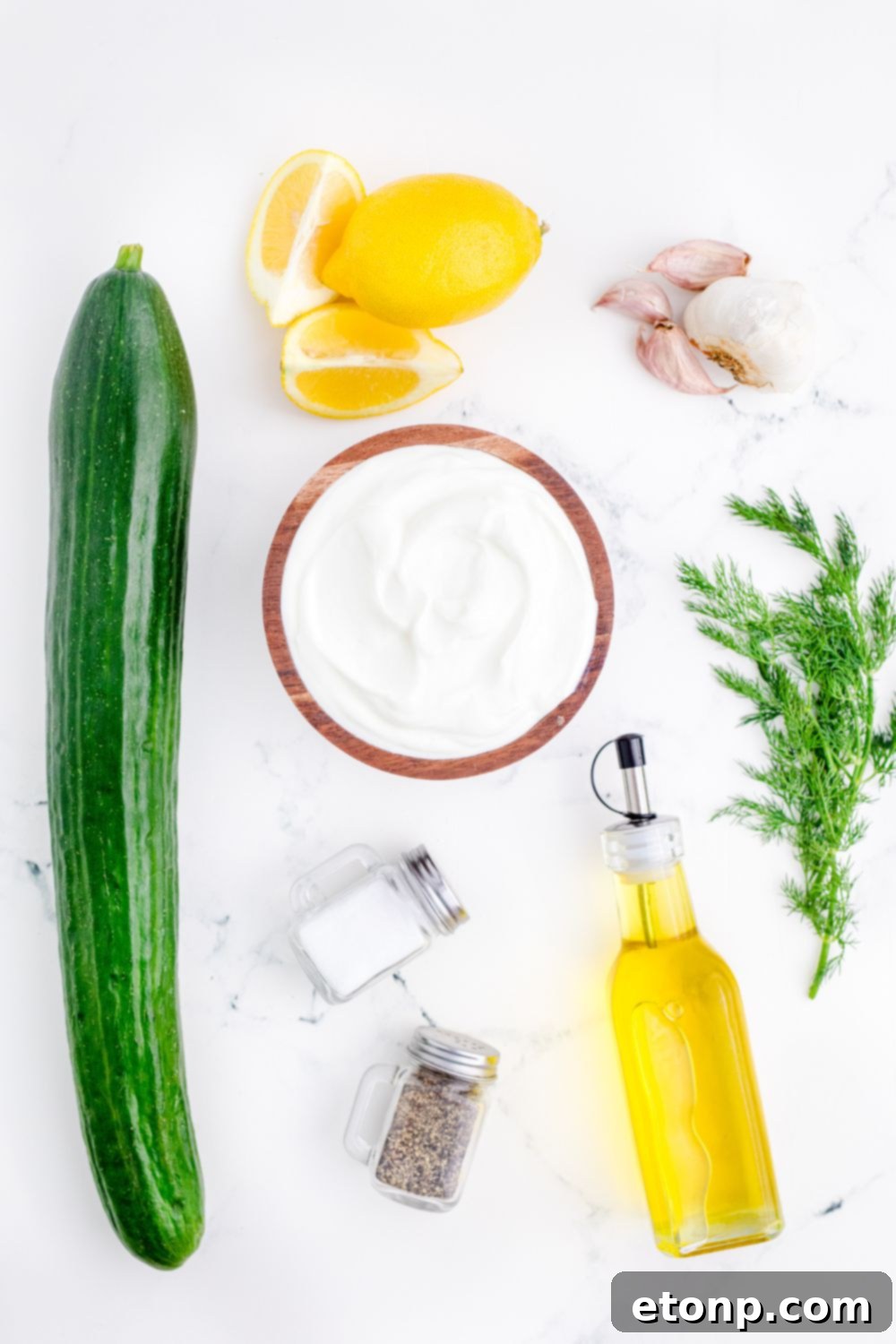 ingredients for Tzatziki Sauce on table in single serve containers 