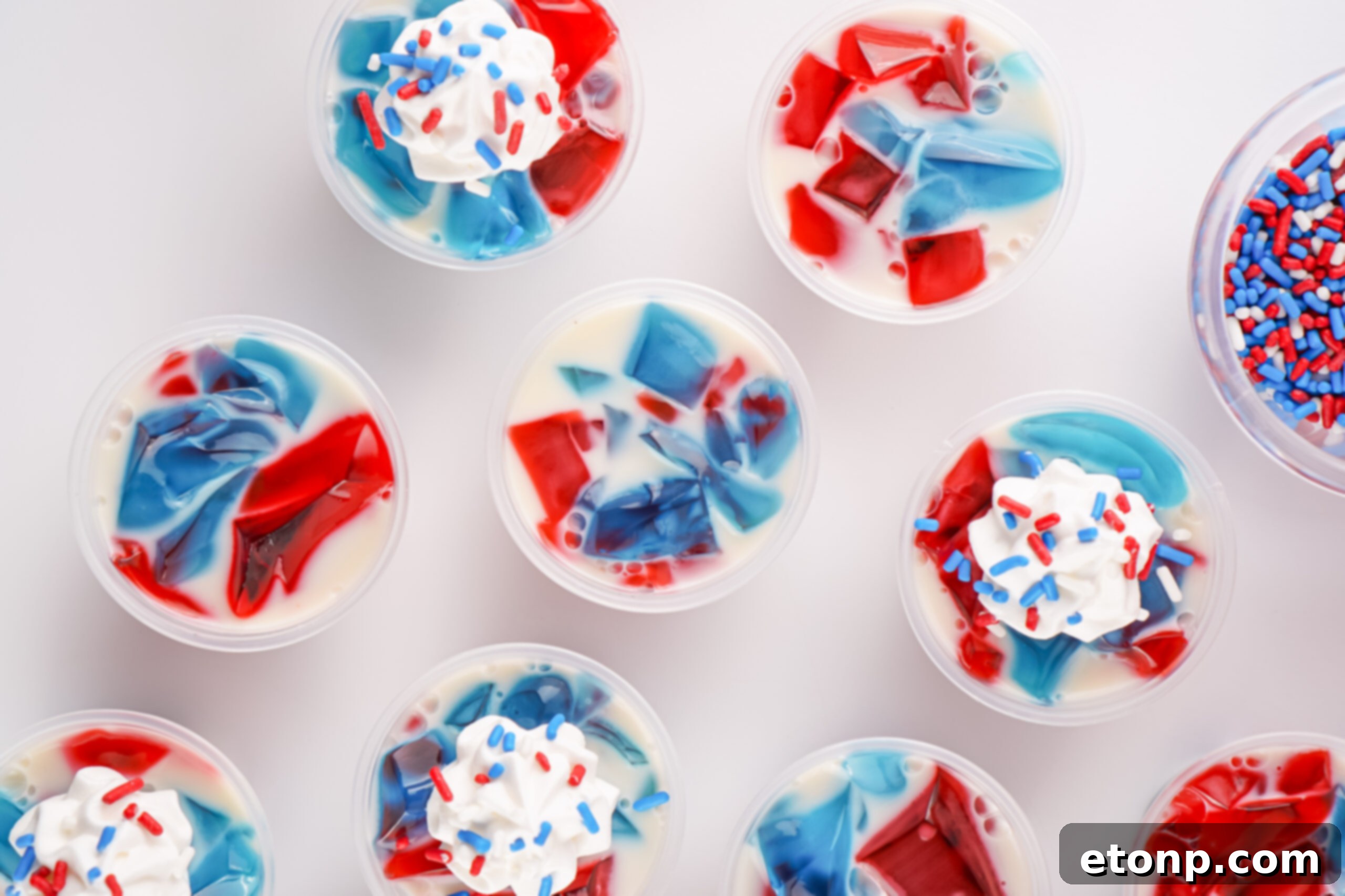 An artistic overhead shot of patriotic jello shots arranged, highlighting their vibrant colors and festive presentation.