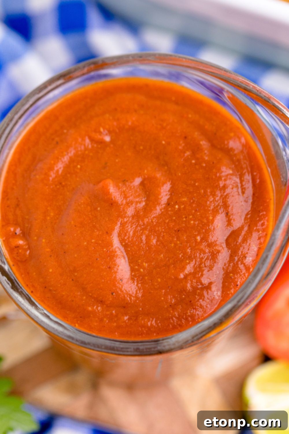 From Scratch Enchilada Perfection 14 overhead view of Homemade Enchilada Sauce in a container, ready for storage or immediate use