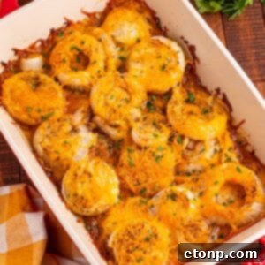 Cheesy Tennessee Onions on a casserole pan on wooden table