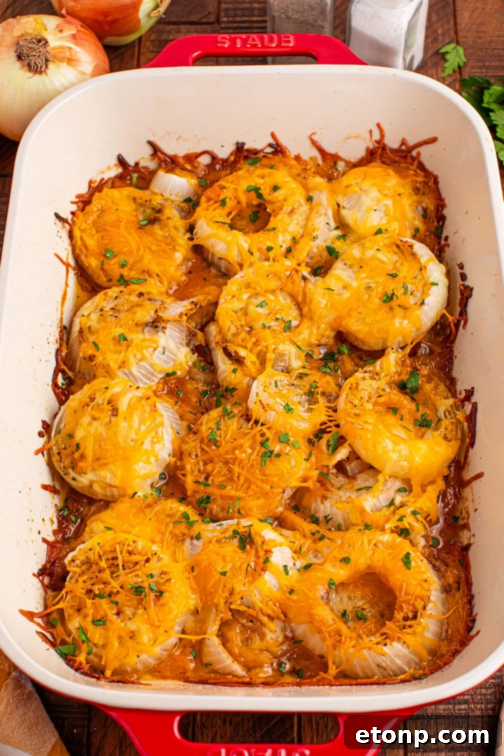 Cheesy Tennessee Onion Bake 10 A casserole dish filled with Cheesy Tennessee Onions, prepared and waiting to be baked.