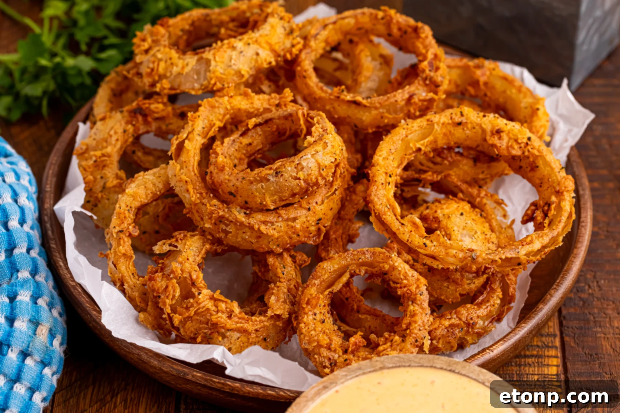 Golden Crispy Homemade Onion Rings 13 Deep Fried Onion Rings on a serving platter
