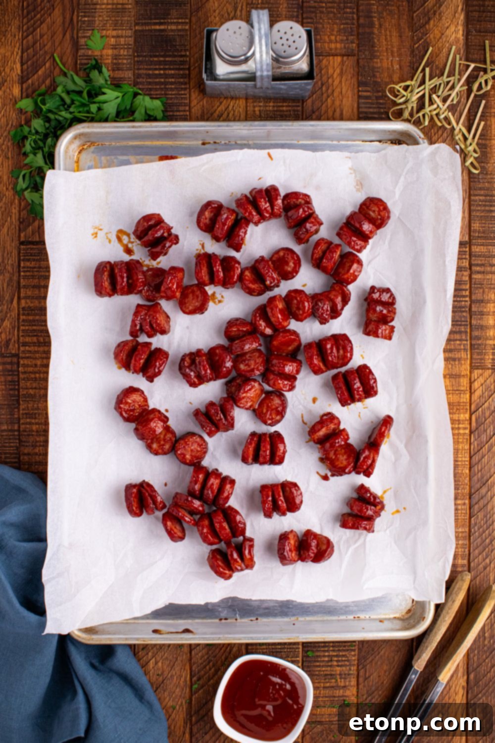 cooked BBQ Hasselback Smoked Sausages on a tray