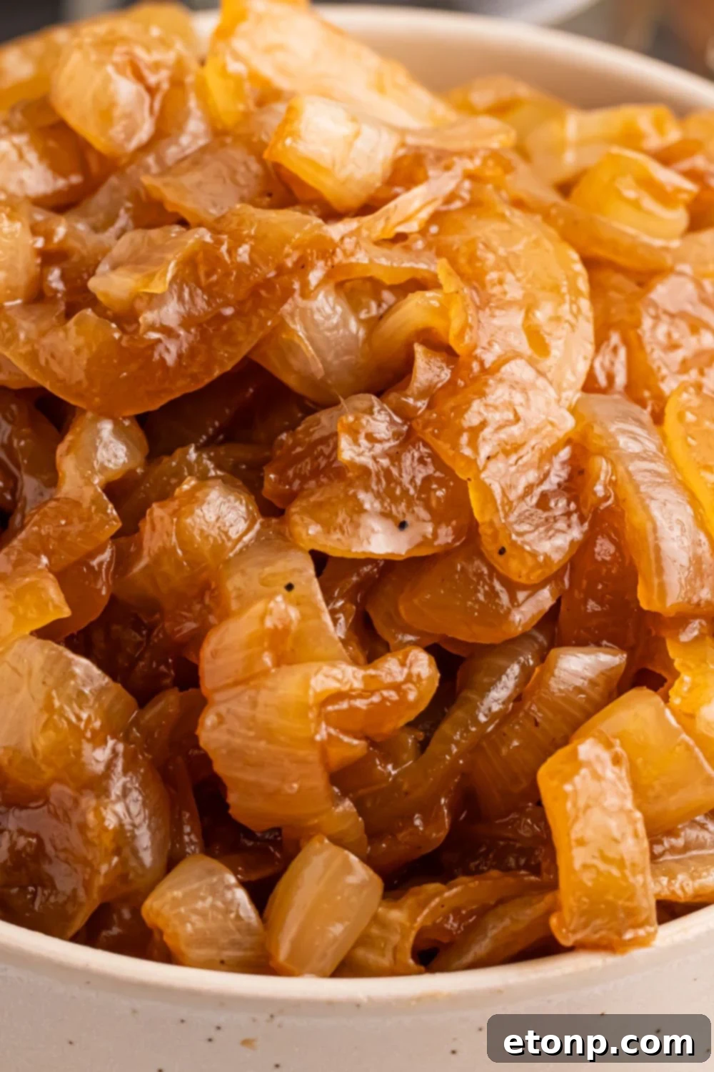 CrockPot Caramelized Onions in a bowl on table 